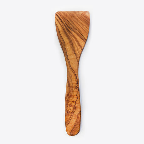 A 12 inch olive wood spatula with a smooth finish and a natural wood grain pattern.