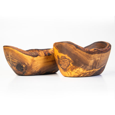 Two small wooden snack bowls with bark edges, handcrafted from olive wood, placed on a white background.