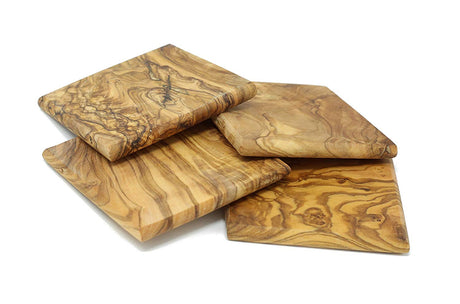A set of four square olivewood coasters with a unique grain pattern, displayed against a white background.